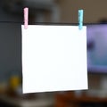 White blank card on rope, dark office background. Creative remin Royalty Free Stock Photo