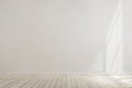 White blank concrete wall mockup with a wooden floor Royalty Free Stock Photo