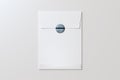 White blank envelope with grey glossy sticker. 3d rendering. Royalty Free Stock Photo