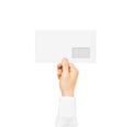 White blank envelope mock up holding in hand. Empty post documen Royalty Free Stock Photo