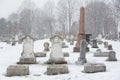 White Blank Grave Stone in Cemetery During Snowfall