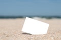 White Blank Instant Photo Card On Beach Sand Royalty Free Stock Photo