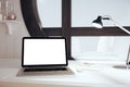 White blank laptop screen with lamp in american style room with Royalty Free Stock Photo