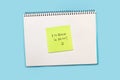 White blank notepad with a sticky paper with Im back in 10 minutes and a smile face draw on it Royalty Free Stock Photo