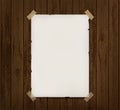 White blank paper poster hanging on wooden wall Royalty Free Stock Photo