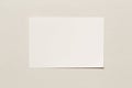 White blank paper sheet over textured plywood painted white Royalty Free Stock Photo