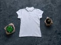 White blank polo t-shirt mockup on dark background. Blank cotton plain shirt collar pocket template for creative design Royalty Free Stock Photo