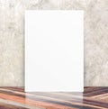 White Blank Poster in crack cement wall and diagonal wooden floor room,Template Mock up for your content,Business presentation Royalty Free Stock Photo