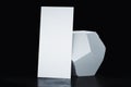 White blank realistic poster next to concrete geometric figure. 3d rendering.