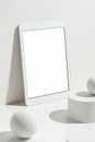 White blank screen digital tablet mockup, template with geometric objects Royalty Free Stock Photo