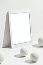 White blank screen digital tablet mockup, template with geometric objects Royalty Free Stock Photo