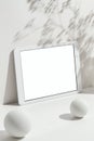 White blank screen digital tablet mockup, template with geometric objects Royalty Free Stock Photo