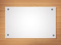 White blank sheet on a wooden background. A template for your design. Royalty Free Stock Photo