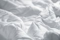 White blanket. Wrinkle messy blanket in bedroom after waking up in the morning. Bed details. Royalty Free Stock Photo