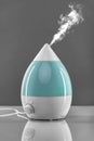 White-blue air humidifier. Royalty Free Stock Photo