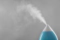 White-blue air humidifier. Royalty Free Stock Photo