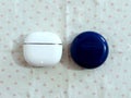 White and Blue AirPod Case Royalty Free Stock Photo