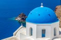 White and blue architecture with churches of Oia village on Santorini island, Greece Royalty Free Stock Photo