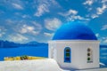 White and blue architecture with domes and churches in Oia, Santorini, Greece Royalty Free Stock Photo