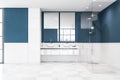 White and blue bathroom, double sink and shower Royalty Free Stock Photo