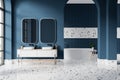 White and blue bathroom interior with double sink and tub Royalty Free Stock Photo