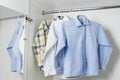 White, blue and checkered clean ironed men's shirts
