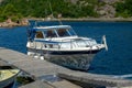 White and blue classic cabin cruiser.. Royalty Free Stock Photo