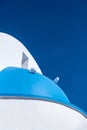 White and blue color church detail on clear blue sky background Royalty Free Stock Photo