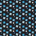 White and blue flower different size pattern black background