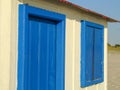 white and blue house on the palafitico wharf in the town of Carrasqueira, AlcÃÂ¡cer do Sal, GrÃÂ¢ndola.