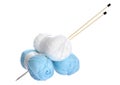 White and blue knitting yarn and needles Royalty Free Stock Photo