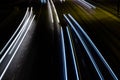 White and blue lights of a car in motion at long exposure on a night highway. Royalty Free Stock Photo