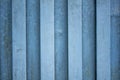 A white blue metal wall. vertical lines. paint and rust stains Royalty Free Stock Photo