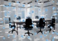White and blue network against blurry meeting room Royalty Free Stock Photo