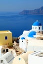 White and blue orthodox church in the village of Oia, Santorini Royalty Free Stock Photo