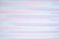 White, blue and pink painted lined on wooden background. Royalty Free Stock Photo