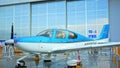 White and blue plane at Zhuhai International Aviation Expo and public Defense Exhibition