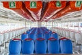 White and blue seats and life jackets or bench rows, a gray floor on a ferry boat deck as a background or a pattern in istanbul Royalty Free Stock Photo