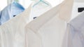 White and blue shirts at a dry cleaners