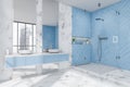 White and blue shower room with modern vanity