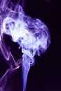 White and blue smoke on black purple background with abstract texture Royalty Free Stock Photo