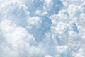 White & blue soft cumulus clouds in the sky close up background, big fluffy cloud texture, beautiful cloudscape skies backdrop