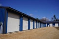 White and Blue storage units being used by the community Royalty Free Stock Photo