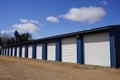 White and Blue storage units being used by the community Royalty Free Stock Photo