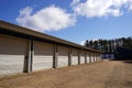 White and Blue storage units being used by the community Royalty Free Stock Photo