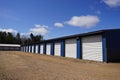 White and Blue storage units being used by the community Royalty Free Stock Photo