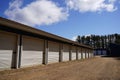 White and Blue storage units being used by the community Royalty Free Stock Photo