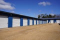 White and Blue storage units being used by the community Royalty Free Stock Photo