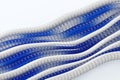 White and blue wave lines 3d background. Network cable of thin glass and plastic strands with silver striped pattern. Fiber optic Royalty Free Stock Photo