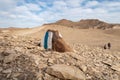 White-blue  way sign in the mountains of the Judean Desert near the Tamarim stream on the Israeli side of the Dead Sea near Royalty Free Stock Photo